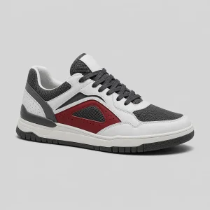 White and blue low-top sneaker on a clean studio background
